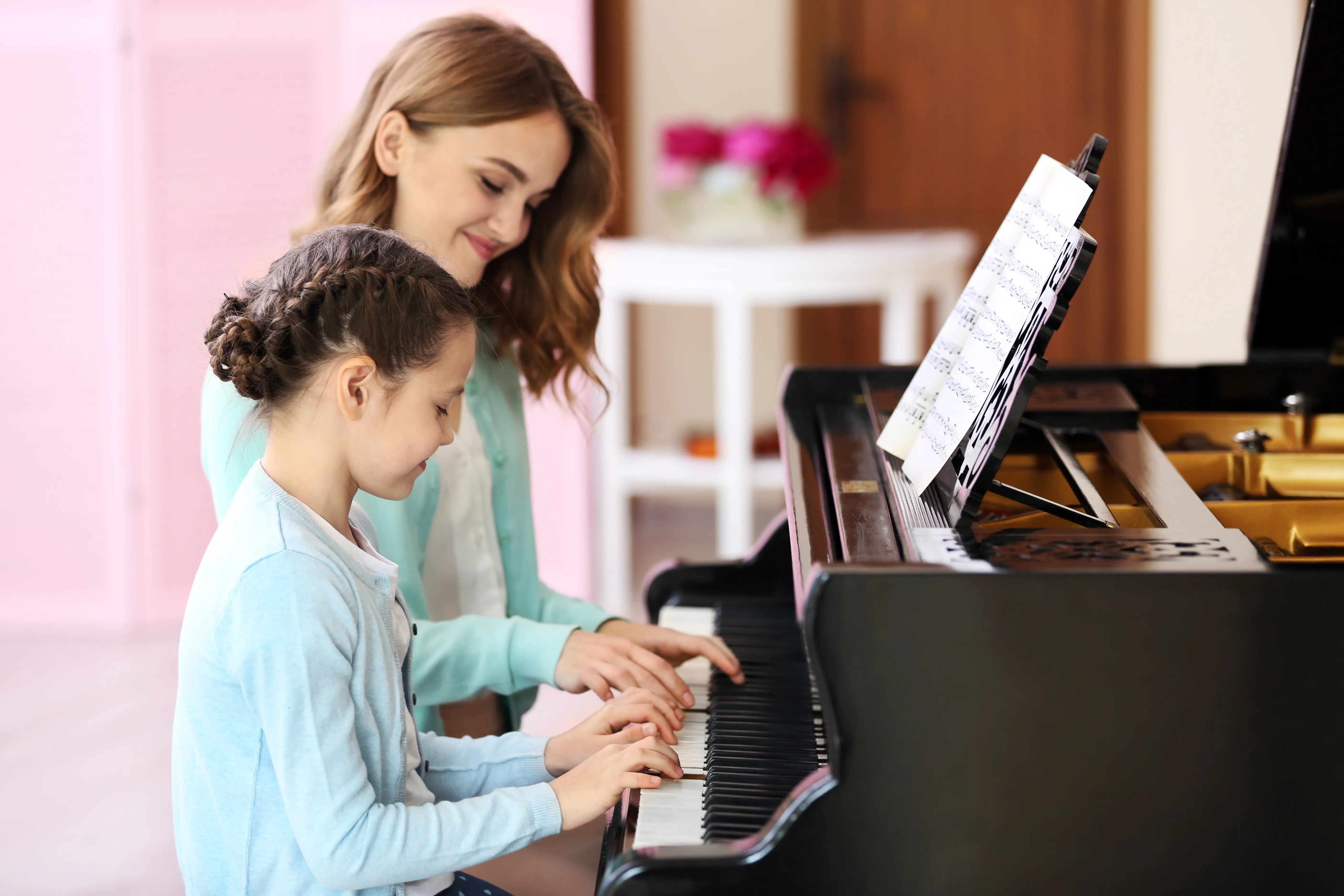 Teacher and student at the piano