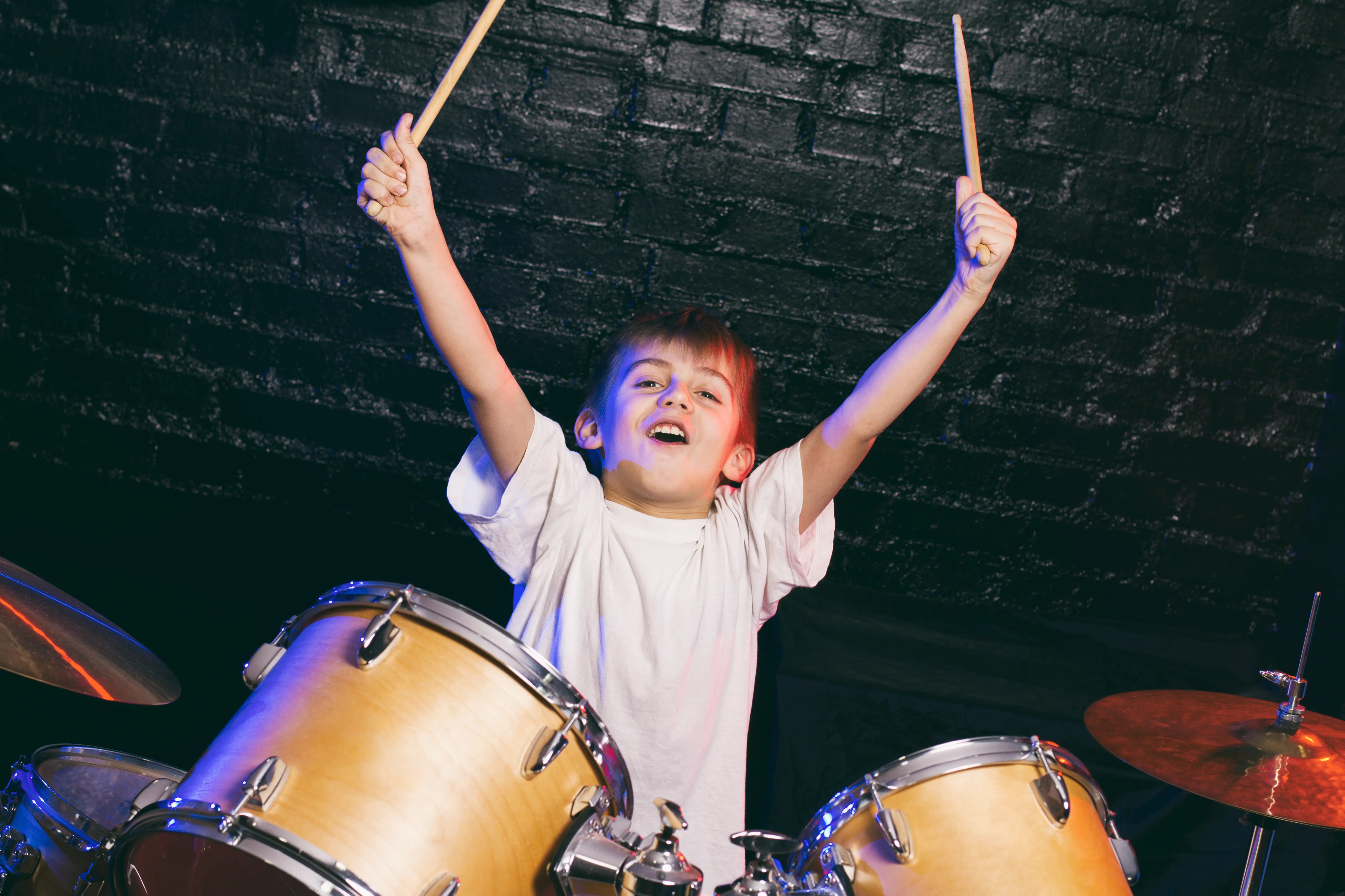 A child playing drums